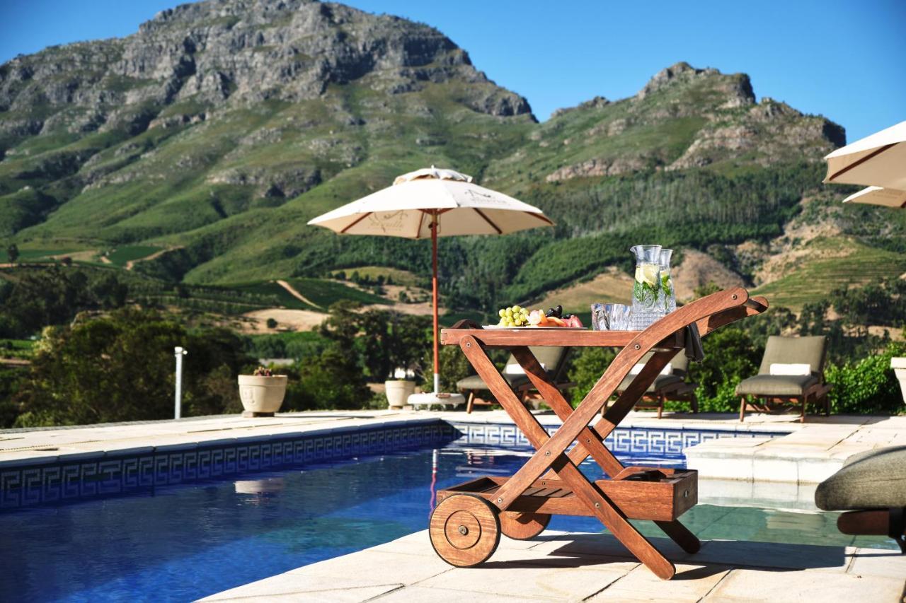 Alluvia Boutique Winery & Luxury Accommodation Stellenbosch Exterior foto A poolside bar cart
