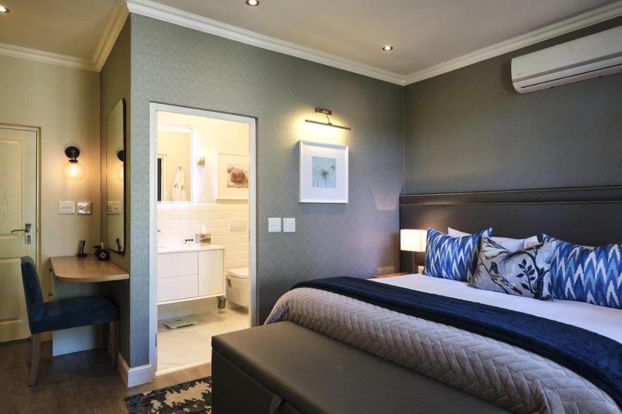 Alluvia Boutique Winery & Luxury Accommodation Stellenbosch Exterior foto A bedroom at the Oyster Box