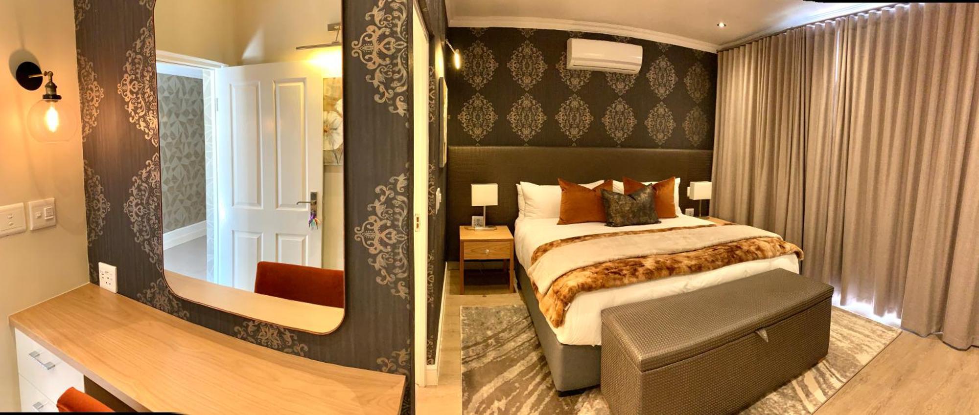 Alluvia Boutique Winery & Luxury Accommodation Stellenbosch Habitación foto A bedroom at the Cape Heritage
